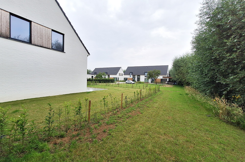 Bostoen WilgenHof in Astene nieuwbouw ruime gezinswoningen laatste woning zijgevel tuin